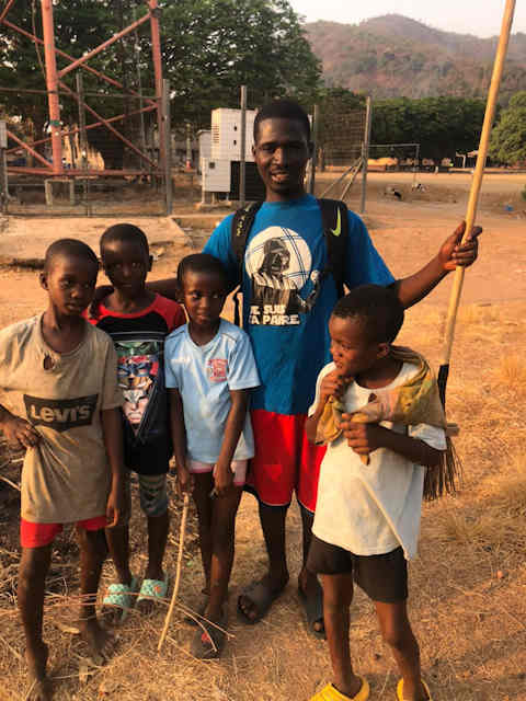 Carlos Kumah and some local children in Wli